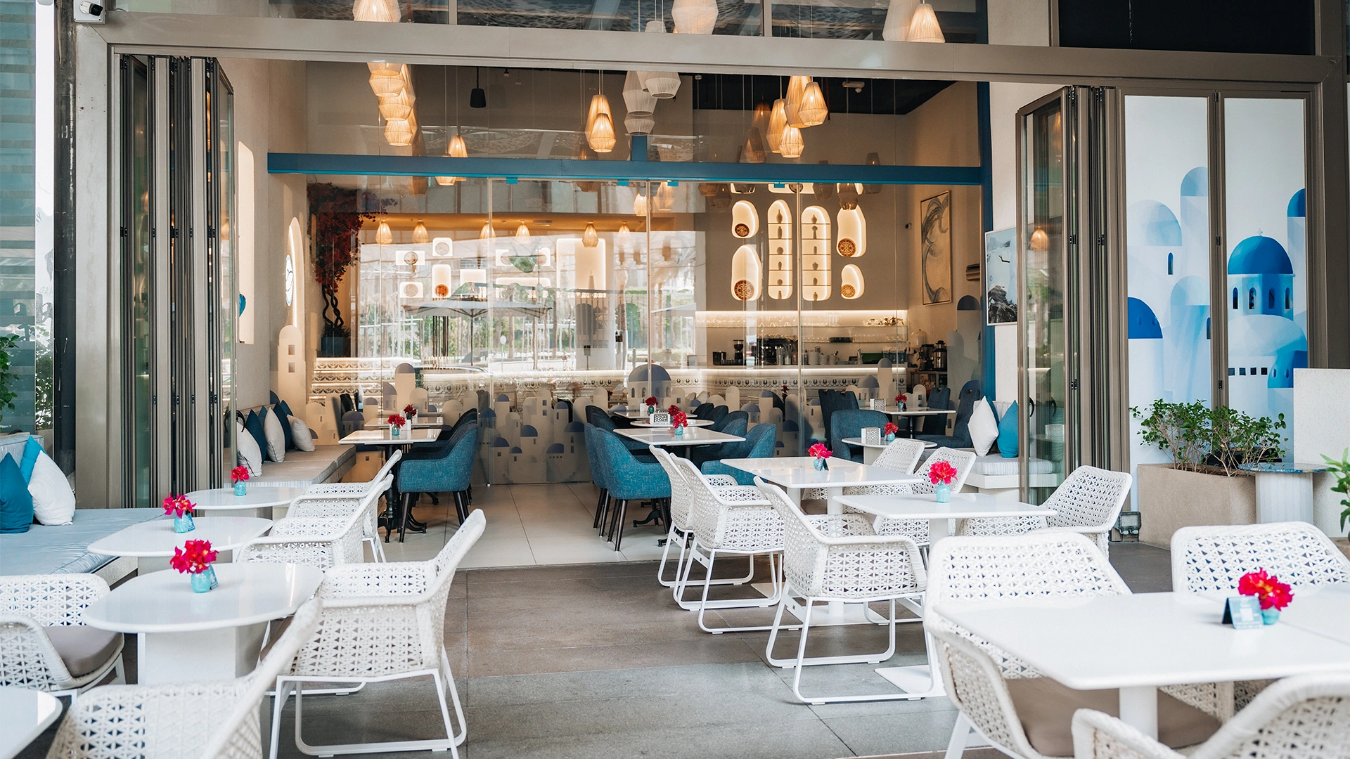 Beautifully plated Greek mezze dishes with fresh vegetables and dips